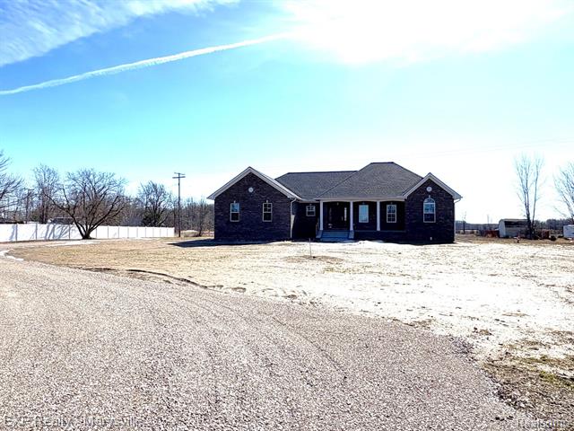 front view picture of 11023 Brandon Road, Emmett, MI. 48022