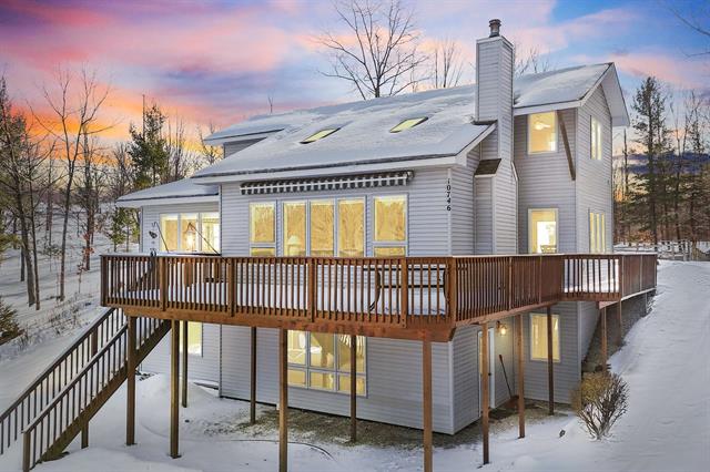 front view picture of 10746 Deal Road, Williamsburg, MI. 49690