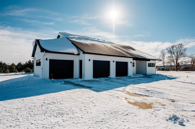 front view picture of 8473 E Boca Vista Trail, Traverse City, MI. 49684