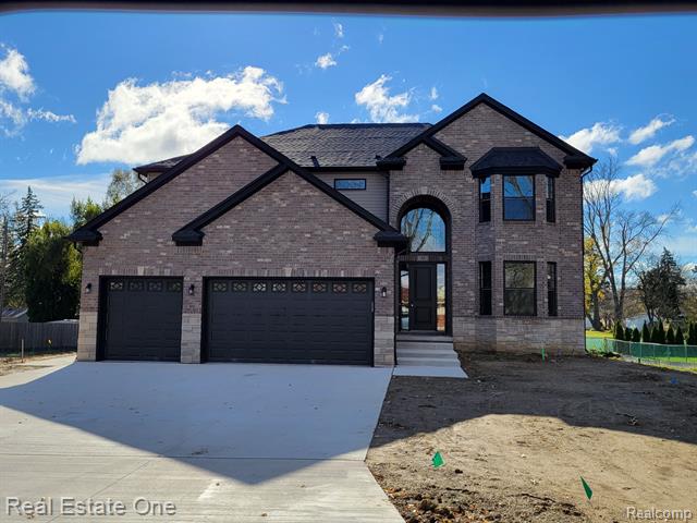front view picture of 611 Vanderpool Drive, Troy, MI. 48083