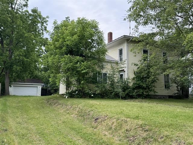 front view picture of 411 W Ash Street, Mason, MI. 48854