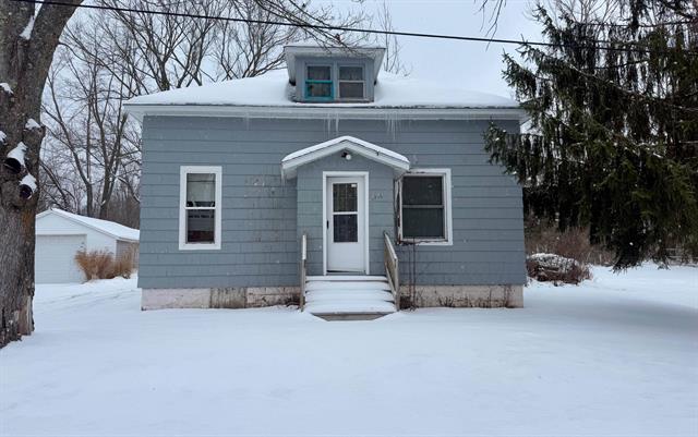 front view picture of 5710 8 Mile Road, Onekama, MI. 49675
