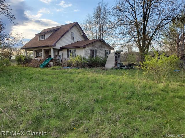 front view picture of 8520 Arkona Road, Clinton, MI. 49236
