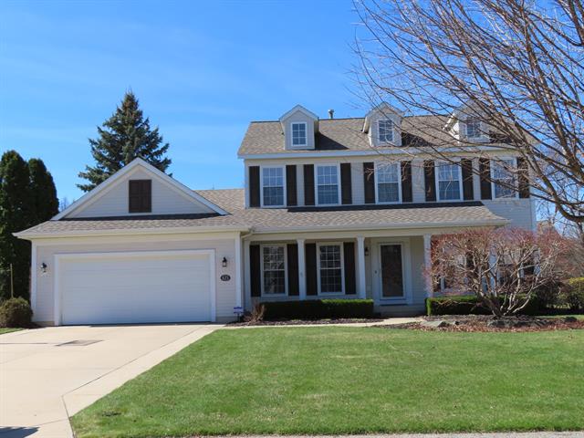 front view picture of 623 Hartfield Drive Se, Ada, MI. 49301