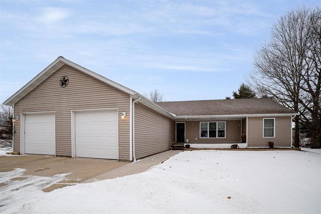 front view picture of 1002 Iberian Drive, Weidman, MI. 48893