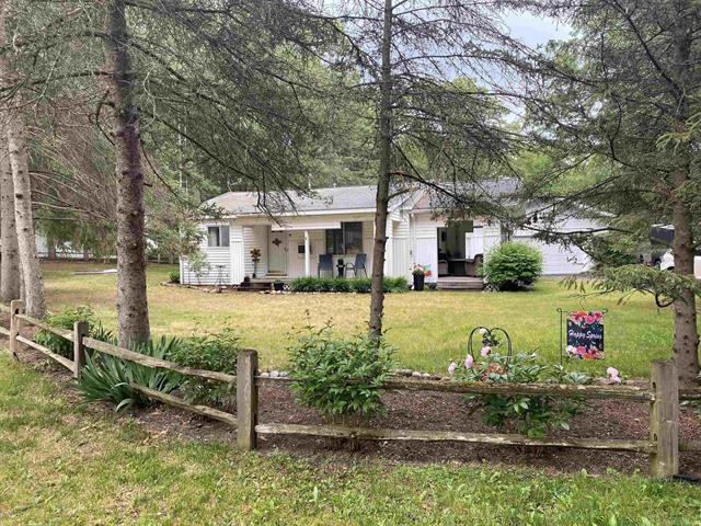front view picture of 118 Beverly Drive, Prudenville, MI. 48651