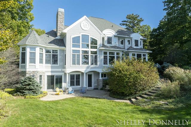 front view picture of 17296 Beach Ridge Way, West Olive, MI. 49460