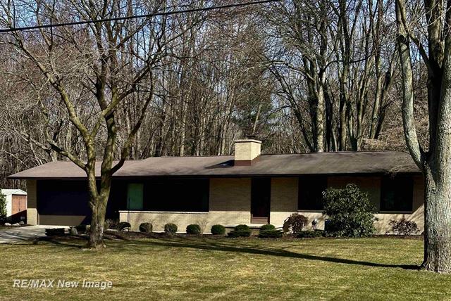 front view picture of 2137 S Poseyville Road, Midland, MI. 48640