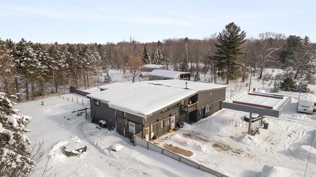front view picture of 8291 Co Road 612 Ne, Kalkaska, MI. 49646