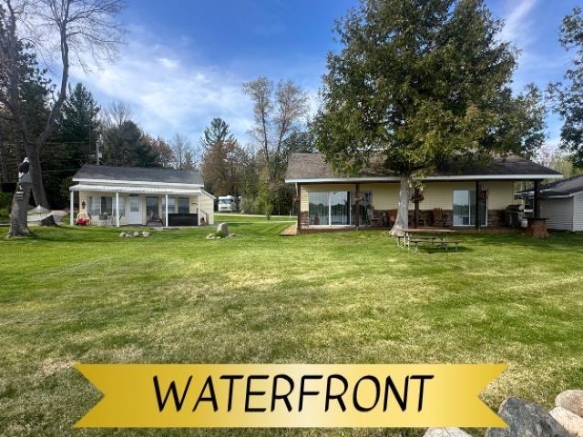 front view picture of 557 N Scott Drive, Farwell, MI. 48622