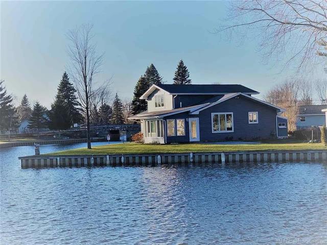 front view picture of 111 Inlet Drive, Prudenville, MI. 48651