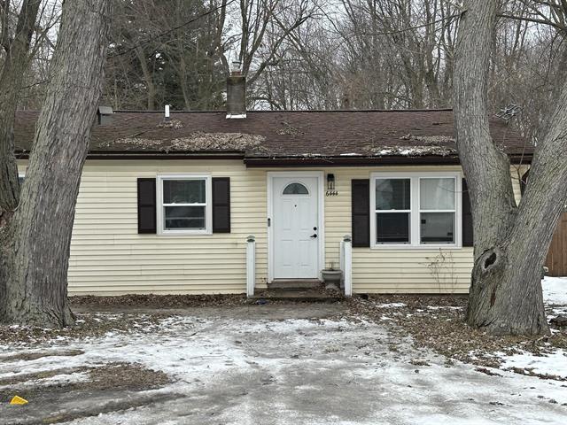 front view picture of 6444 Sommerset Road, Lansing, MI. 48911