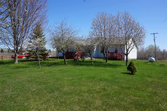 front view picture of 1758 Manor Road, Au Gres, MI. 48703
