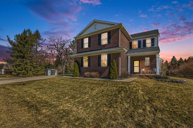 front view picture of 9945 Floros Lane, South Lyon, MI. 48178
