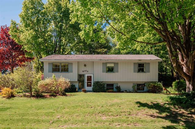 front view picture of 8173 Bel Cherrie Drive, Traverse City, MI. 49686