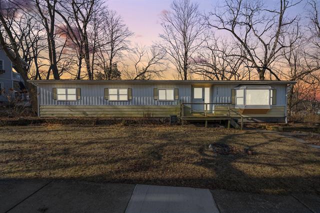 front view picture of 7795 Ann Arbor Street, Dexter, MI. 48130