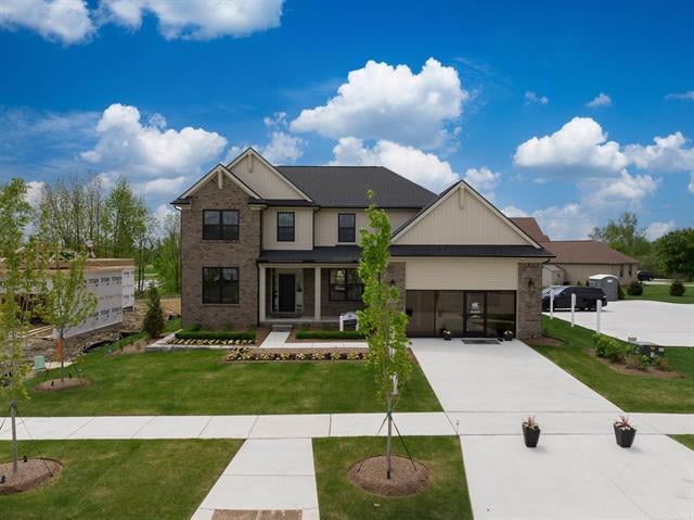 front view picture of 17447 Megan Drive, Macomb, MI. 48042