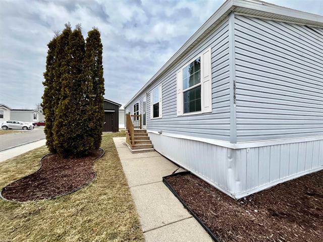 front view picture of 12161 Creekview Avenue, Romeo, MI. 48065