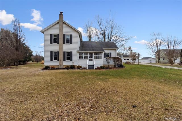 front view picture of 10375 E Lovejoy Road, Perry, MI. 48872