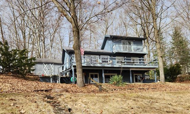 front view picture of 7461 White Birch Drive, Farwell, MI. 48622