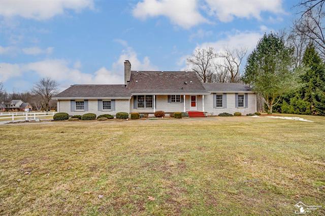 front view picture of 8038 Reinhardt Road, Carleton, MI. 48117