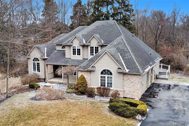 front view picture of 4859 Windswept Drive, Milford, MI. 48380