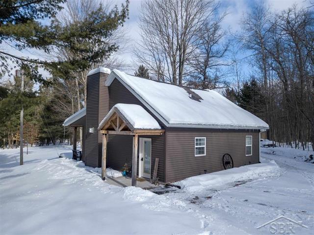 front view picture of 4045 E Haskell Lake Road, Harrison, MI. 48625