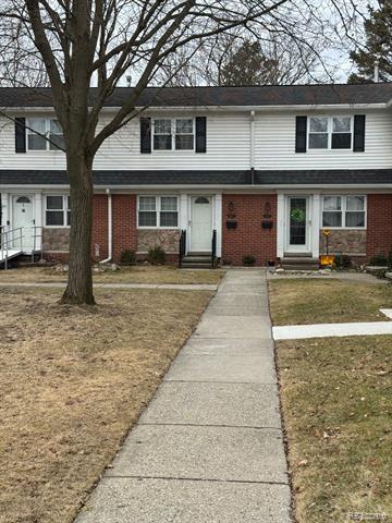 front view picture of 45577 Kensington Street, Utica, MI. 48317