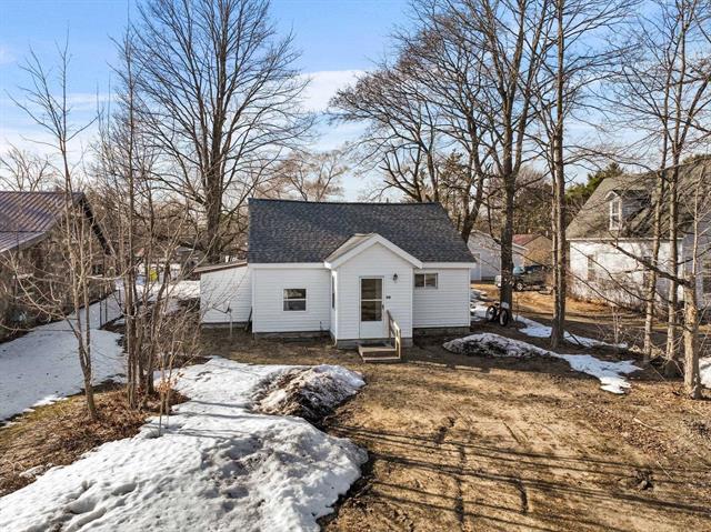 front view picture of 314 S Coral Street, Kalkaska, MI. 49646