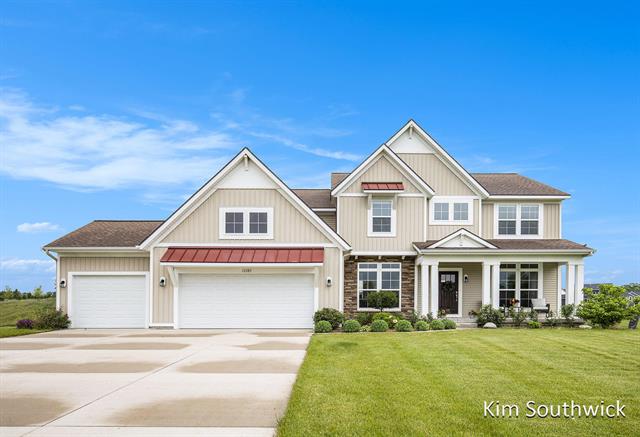 front view picture of 12285 Apple Cart Lane, Lowell, MI. 49331