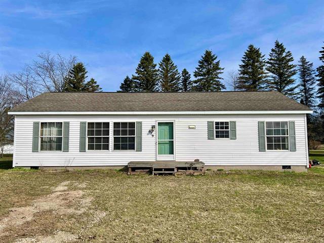 front view picture of 979 Sunset Lane, Kalkaska, MI. 49646