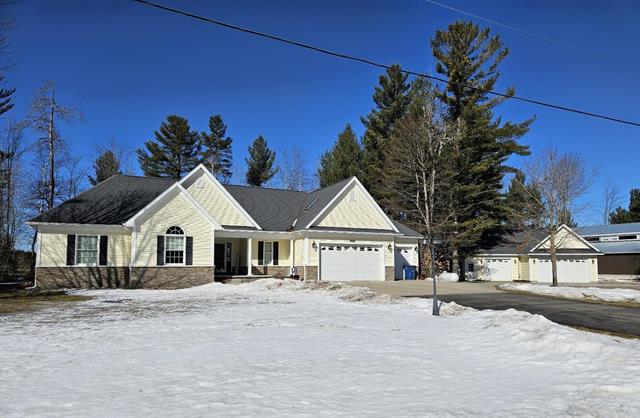 front view picture of 444 S Remington Drive, Tawas City, MI. 48763