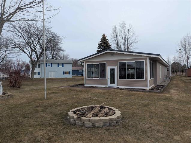 front view picture of 1656 Riverside Drive, Au Gres, MI. 48703