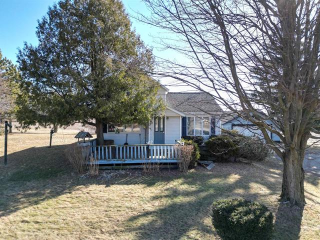 front view picture of 11669 W County Line Road, Blanchard, MI. 49310