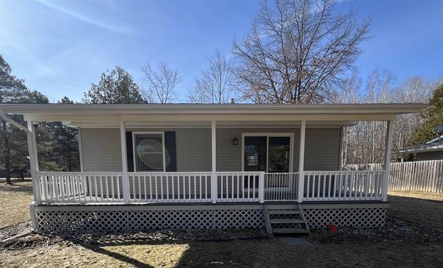 front view picture of 1072 Rock Trail Street, Beaverton, MI. 48612