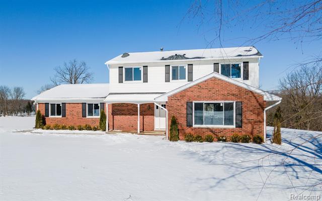 front view picture of 8435 5 Mile Road, Northville, MI. 48168