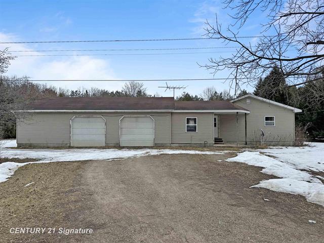 front view picture of 4240 N Woodruff Road, Weidman, MI. 48893