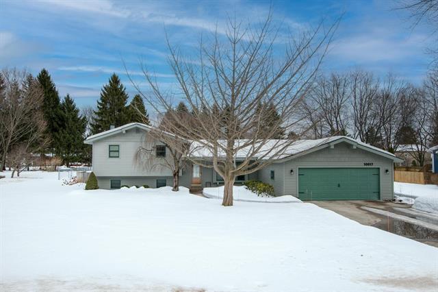 front view picture of 10017 E Lakeview Hills Road, Traverse City, MI. 49684