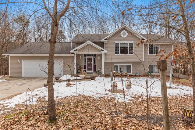 front view picture of 10628 Blue Spruce Drive Ne, Rockford, MI. 49341