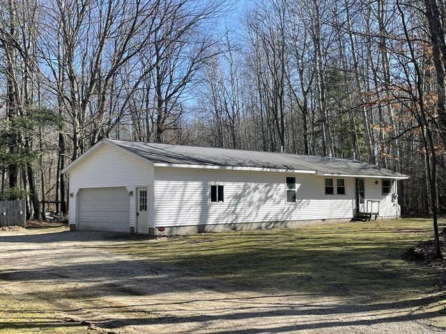 front view picture of 18150 Stronach Dam Road, Wellston, MI. 49689