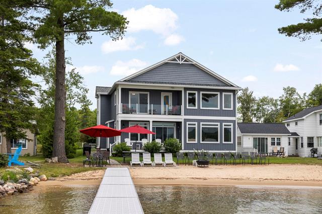 front view picture of 7398 Crystal Beach Road, Rapid City, MI. 49676