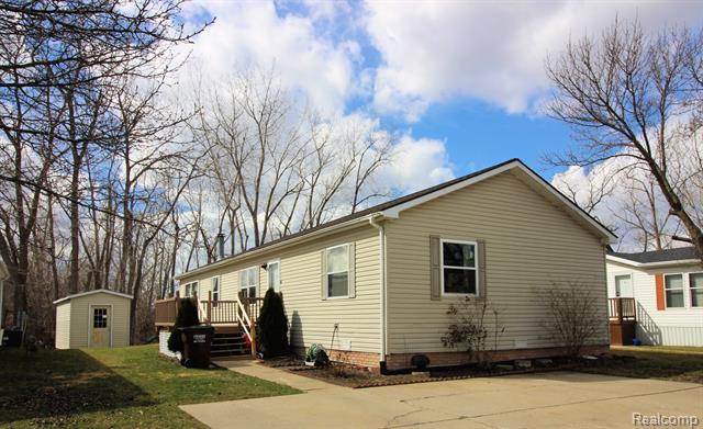 front view picture of 9075 Water Ridge Drive, Newport, MI. 48166