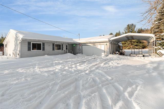 front view picture of 997 N Plank Road, Tawas City, MI. 48763