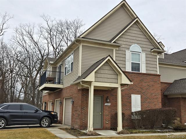 front view picture of 27629 Hidden Oaks Drive, Trenton, MI. 48183
