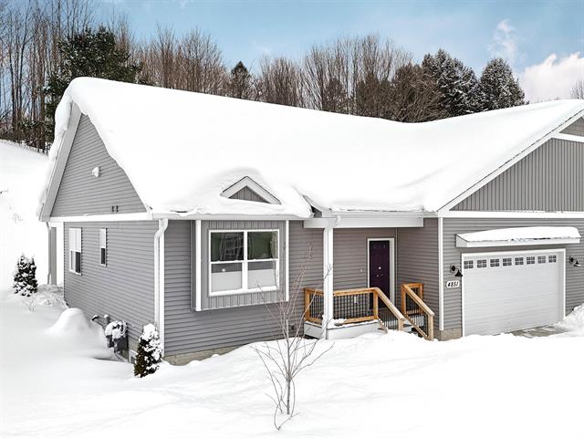 front view picture of 4851 Kodiak Drive, Traverse City, MI. 49684