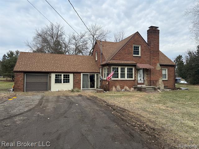 front view picture of 6336 Flushing Road, Flushing, MI. 48433