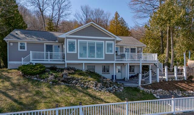 front view picture of 705 S Nanagosa Trail, Suttons Bay, MI. 49682