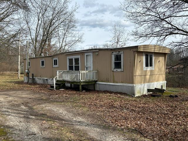 front view picture of 11376 Heintzelman Road Ne, Rockford, MI. 49341