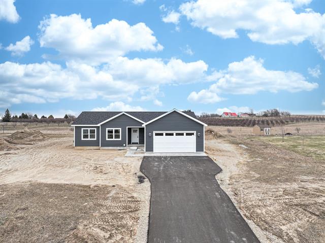 front view picture of 7528 E Meadows Drive, Cedar, MI. 49621