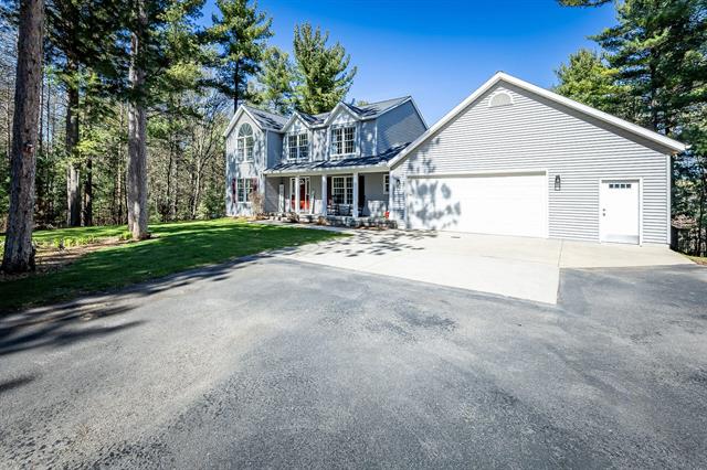 front view picture of 7504 Wiczer Drive, Whitehall, MI. 49461